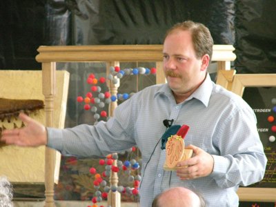 Ian Juby showing off items from his traveling Creation Evidence Museum of Canada